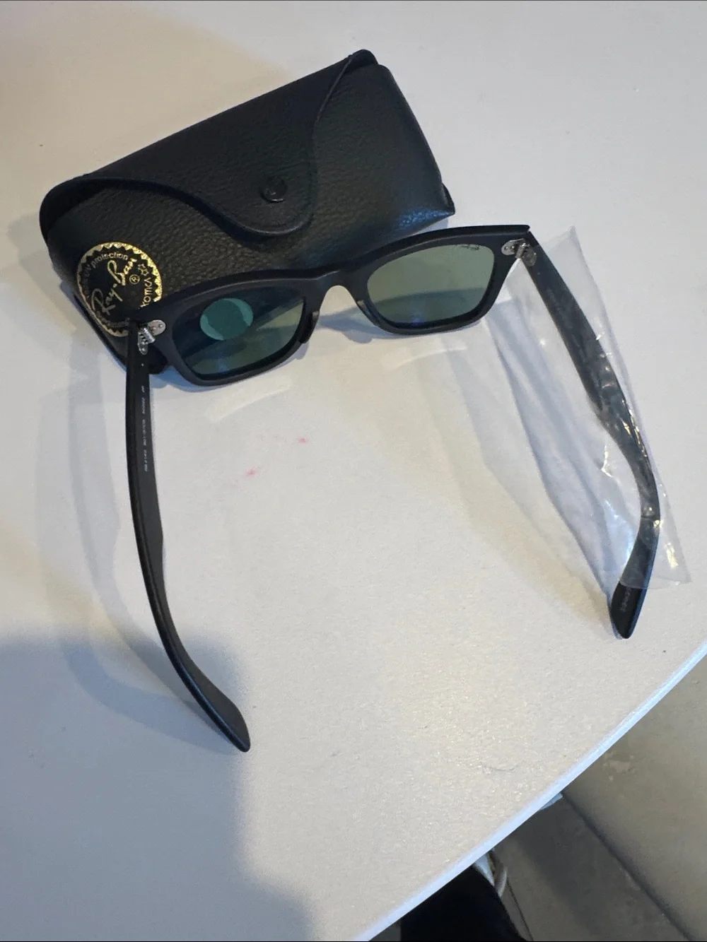 Ray-Ban Black Wayfarer Sunglasses with Green Polarized Lenses